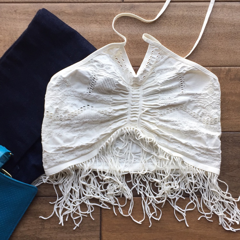 Stretchy fringe halter top in ivory